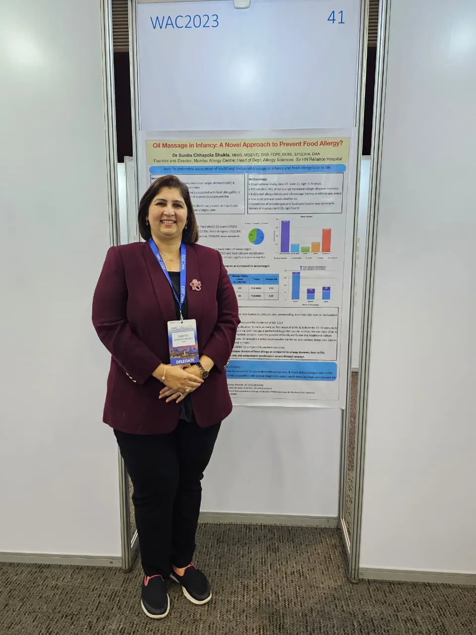 Dr. Sunita Chhapola Shukla with her poster at the World Allergy Congress in Bangkok